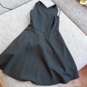 Cross back black cocktail dress